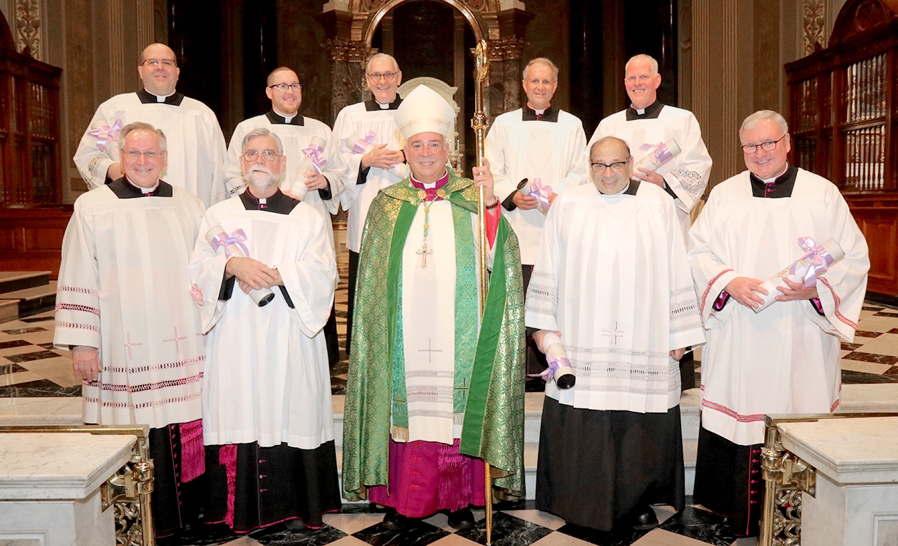 Msgr. Majoros, Msgr. Depman, Archbishop, Puelo, Msgr. Duncan
DiMaria, Brabazon, McKay, Msgr. Dougherty, Rogers