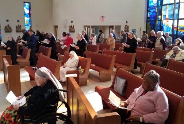 people worshipping in church